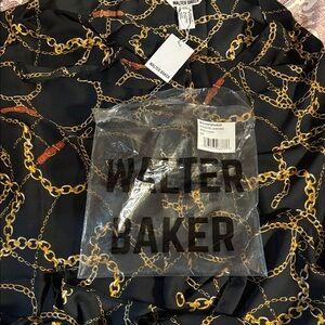 Walter Baker Black Top with Gold Chain Design Versatile Item​